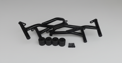 Black metal frame components on a white surface with cardboard boxes in the background