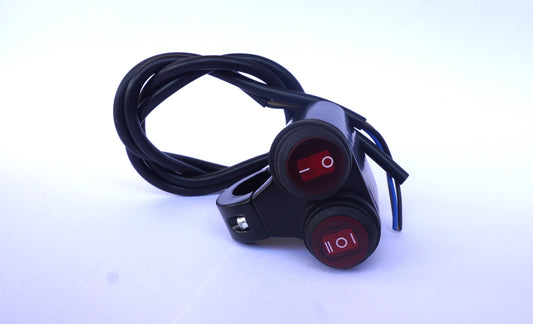 Two black toggle switches with red indicator lights on a white background